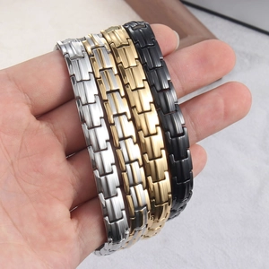 Titanium steel magnetic bracelets in silver, gold, and black with turtleback links