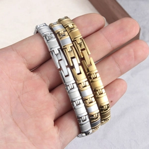 Close-up of stainless steel magnetic therapy bracelets with link watchband design
