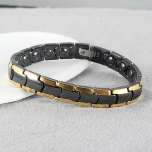Black and gold magnetic health bracelet for men with arrow-shaped links and matte finish
