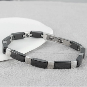 Bracciale magnetoterapico minimalista in acciaio inossidabile e ceramica nera da donna