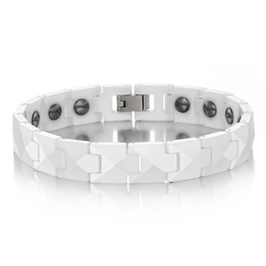 Macro detail of white ceramic geometric links with embedded magnetic stones and metal clasp