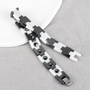 Minimalist black and white ceramic bracelet with magnetic hematite therapy stones