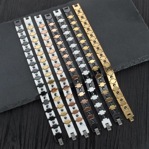 Collection of magnetic H-link ceramic bracelets in various metal finishes on a stone surface