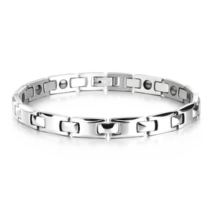 Detail of silver stainless steel magnetic bracelet with black therapy magnets