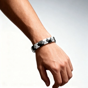 Macro view of geometric ceramic links on a magnetic bracelet for men and women