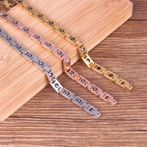 Detailed view of stainless steel magnetic bracelets in gold, rose gold and silver