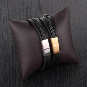 Multi-layer black braided leather bracelet with magnetic metal clasp on leather cushion