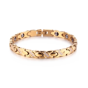 Detail view of rose gold X-link magnetic bracelet with cubic zirconia and fold-over clasp
