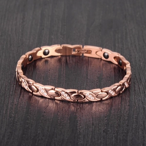 Rose gold twisted X-shape stainless steel bracelet with zircon and magnetic stone