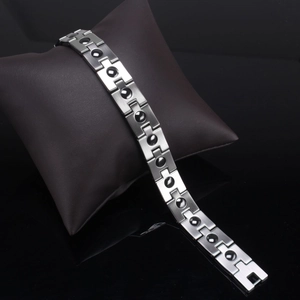 Men's magnetic therapy bracelet in silver stainless steel with black stone inserts