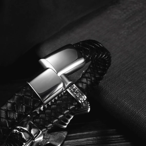Close-up of premium braided leather bracelet with a polished silver stainless steel buckle