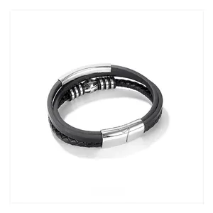 Detail of multi-layer black leather bracelet with brushed steel clasp and metal rings