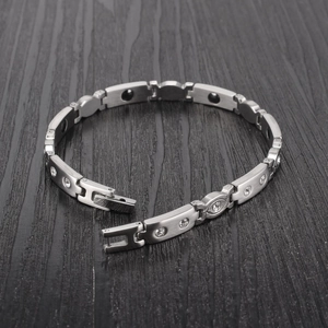 Minimalist titanium steel bracelet with evil eye zircons and magnetic therapy elements