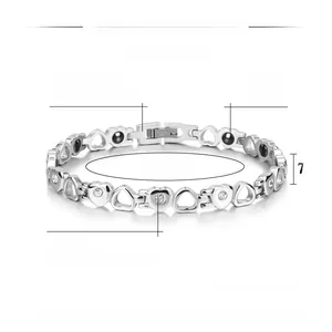 Detail view of steel heart bracelet showing magnetic stones and AAA cubic zirconia