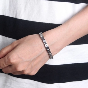 Silver-toned titanium steel bracelet with evil eye zircon crystals for women