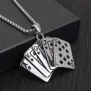Macro view of stainless steel poker royal flush pendant with black spade enamel detail