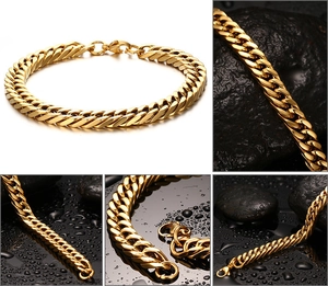 Polished gold Cuban link bracelet for men with secure lobster clasp on black stone background