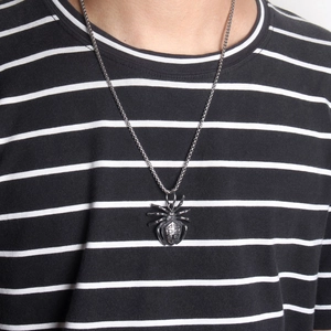 Vintage gothic spider pendant in titanium steel with detailed cross-frame belly design