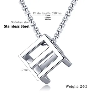 Macro shot of stainless steel hollow cube pendant with dimensions 17mm and box chain