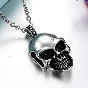 Cool skull pendant necklace for men in polished stainless steel with black accents