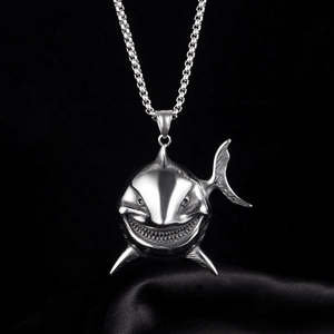 Polished stainless steel shark head pendant with detailed teeth on a box chain