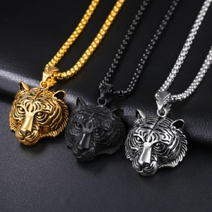 Vintage stainless steel tiger head pendant necklaces in gold, black, and silver finishes