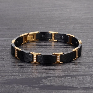 Bracelet magnétique homme en céramique avec accents dorés et zircons sur bois