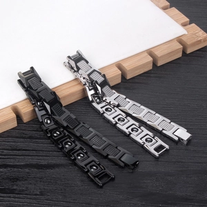 Fashionable tungsten magnetic bracelet for men with textured links in black and silver finishes