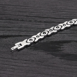 Polished stainless steel X-shaped leaf bracelet with magnetic clasp for women