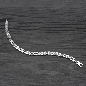 Silver X-shaped leaf magnetic therapy bracelet for women in polished stainless steel