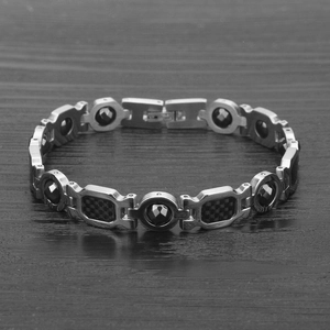 Men's magnetic carbon fiber stainless steel link bracelet with rhombic bead details
