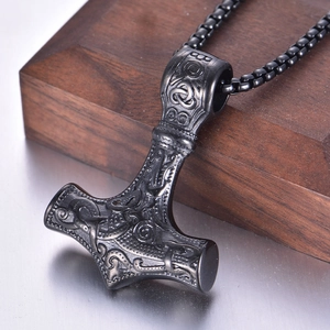 Vintage stainless steel Mjölnir pendant on black box chain for men with Norse carvings