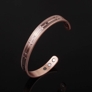 Vintage copper magnetic therapy cuff bracelet with cross relief and adjustable open design