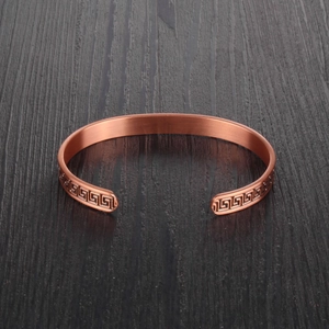 Adjustable copper magnetic health bracelet with vintage meander patterns and matte finish