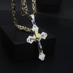 Three-layer gold and silver cross pendant necklace with clear zircons on a Byzantine chain