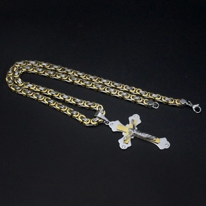 Iced out gold and silver two-tone cross pendant necklace with Byzantine chain