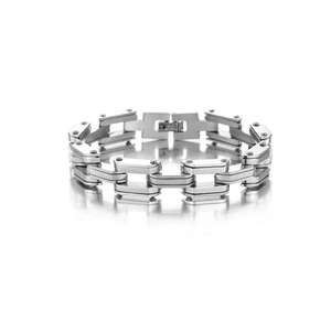 Macro detail of industrial H-link chain bracelet with decorative side screw accents