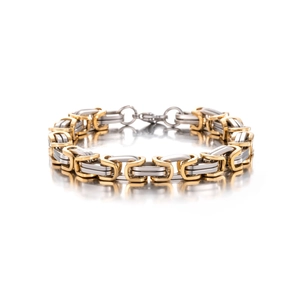 Close-up of gold and silver Byzantine chain bracelet with a high-polished lobster clasp
