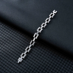 Detailed close-up of industrial style multi-layer titanium steel bracelet for men