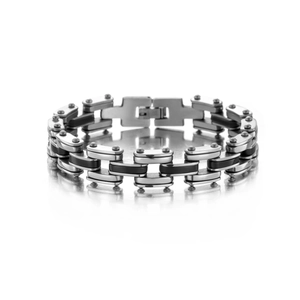 Macro detail of industrial style men's titanium steel bracelet with black silicone links