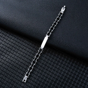 Men's stainless steel bicycle chain bracelet with polished ID plate on black leather