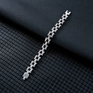 Detailed shot of silver stainless steel bike chain bracelet with a folding clasp closure