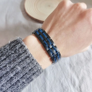 Men's titanium steel bracelet featuring black matte and blue polished geometric links