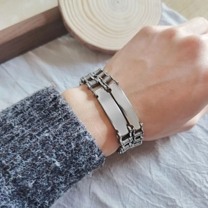 Polished double-row stainless steel motorcycle chain bracelet with metal ID plates