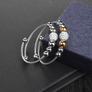 Fashionable steel cable wire cuff bracelet set with zircon beads on a gift box