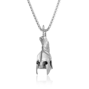 Macro detail of silver spartan helmet pendant with polished steel finish and fine texture