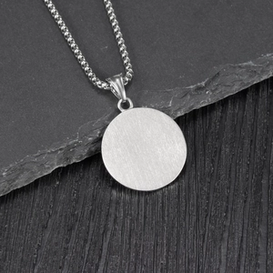 Retro spartan warrior silver pendant necklace with box chain on textured stone
