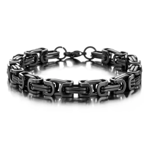 Men's matte black Byzantine square link chain bracelet with lobster clasp on reflective surface