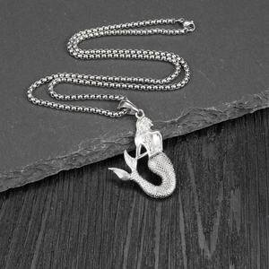 Silver mermaid pendant necklace on dark stone, hip hop style jewelry for men and women