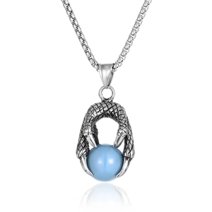 Pendentif griffe de dragon en acier inoxydable avec pierre bleue sur fond blanc pur